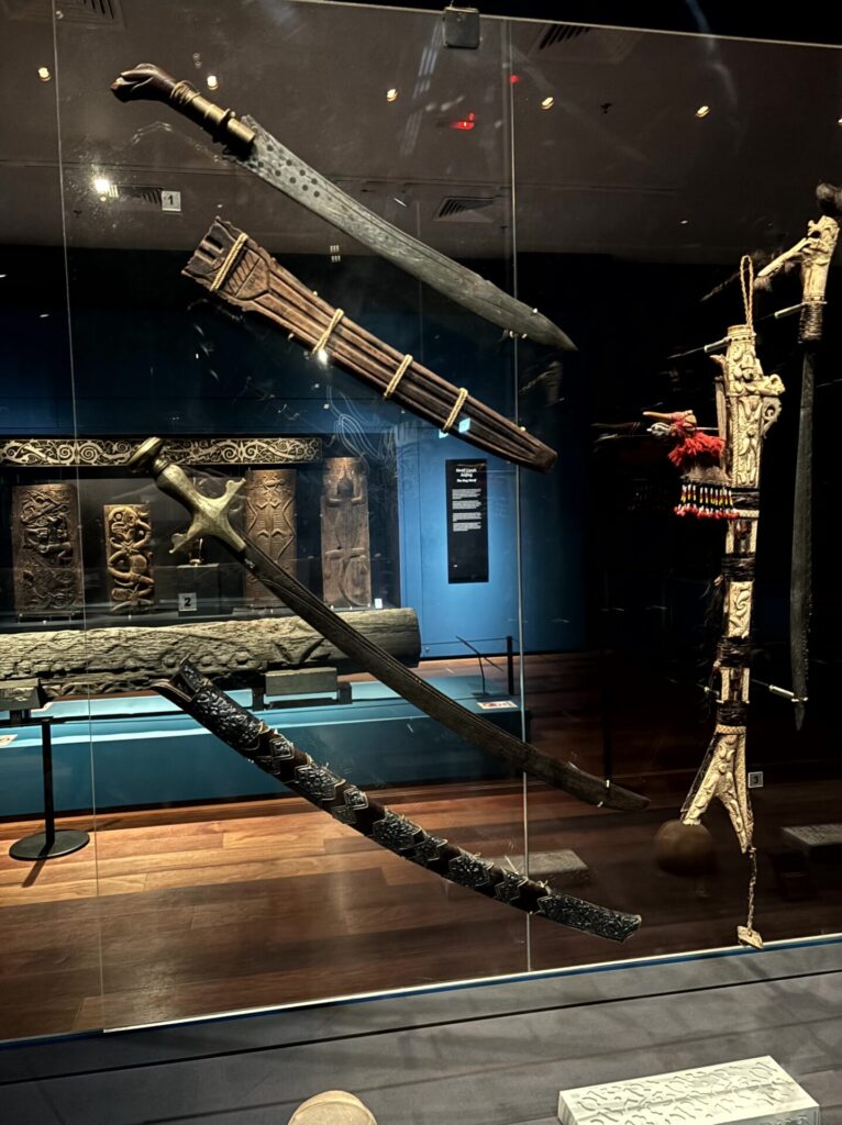 Carved hilt and scabbard of a Bornean parang