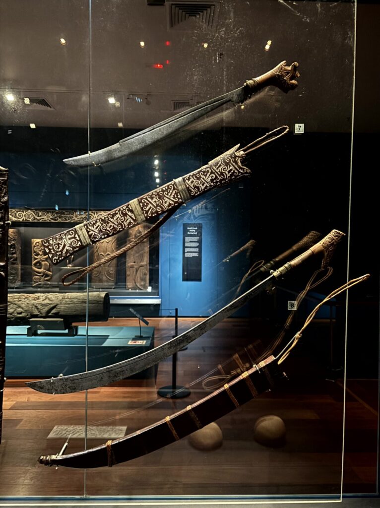 Carved hilt and scabbard of a Bornean parang