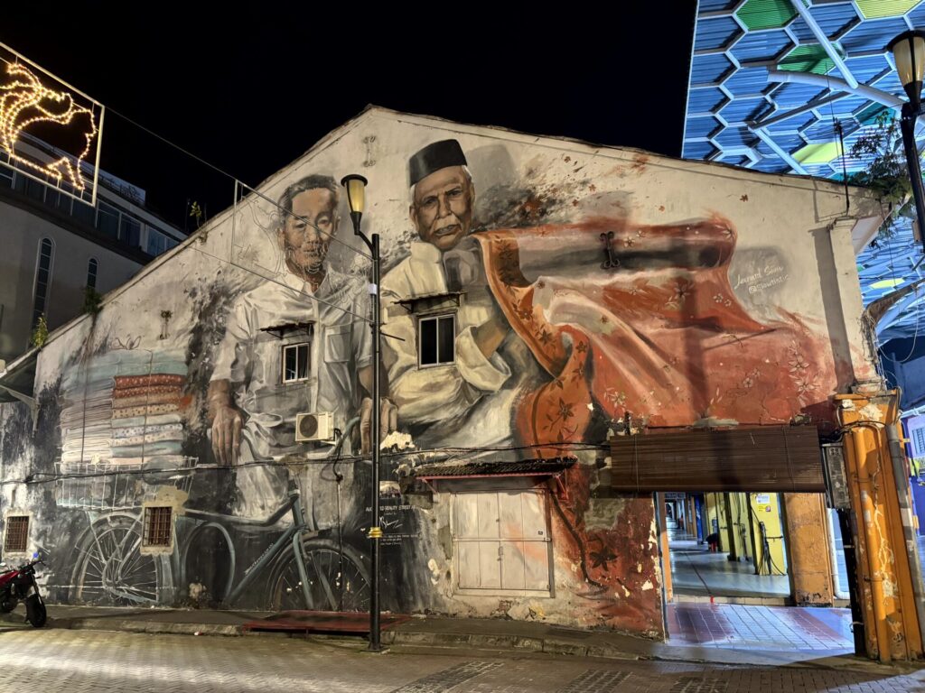 Mural of fabric sellers in Kuching