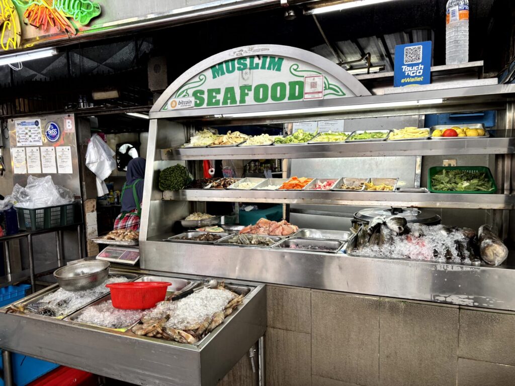 Halal seafood dishes at a restaurant in Kuching